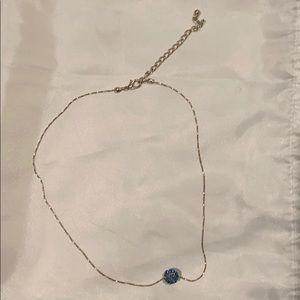 Silver extendable chain with light blue charm